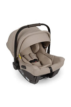 
                        
                          Load image into Gallery viewer, Beige baby car seat with black straps on a white background
                        
                      