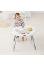 
                        
                          Load image into Gallery viewer, Skip Hop Explore &amp; More 3-Stage Activity Centre - Online Exclusive a girl seatin writing on the table
                        
                      