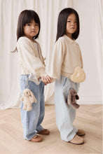 
                        
                          Load image into Gallery viewer, Snuggle Bunnies Penelope Keyring color in Spice two girl hold hand
                        
                      