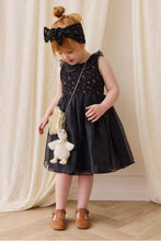 
                        
                          Load image into Gallery viewer, Snuggle Bunnies Rosie Keyring - Rosie The Duck a toddler wearing a black dress
                        
                      