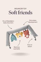
                        
                          Load image into Gallery viewer, Bouncer toy with soft animal figures and text highlighting features on a light background
                        
                      