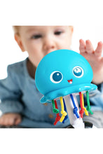 
                        
                          Load image into Gallery viewer, Baby Einstein Ocean Glow Sensory Shaker Musical Toy
                        
                      