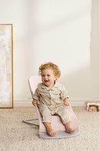 
                        
                          Load image into Gallery viewer, Babybjorn Bouncer Bliss Woven Mélange (Light Pink) toddler sitting on the bouncer
                        
                      
