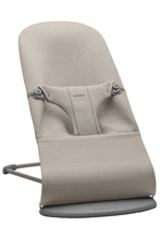 
                        
                          Load image into Gallery viewer, Beige baby bouncer with 'BabyBjörn' branding on a white background
                        
                      