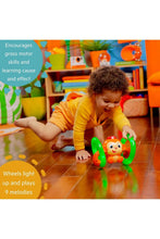 
                        
                          Load image into Gallery viewer, Bright Starts Roll &amp; Glow Monkey Toy with Lights and Melodies
                        
                      