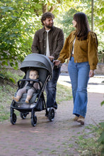 
                        
                          Load image into Gallery viewer, joie parcel lx stroller in color eclipse, a man pushing a pushchair with baby
                        
                      