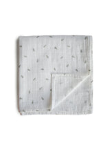 
                        
                          Load image into Gallery viewer, Mushie Organic Cotton Muslin Swaddle Blanket Leaves 1
                        
                      