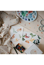 
                        
                          Load image into Gallery viewer, Mushie Silicone Baby Bib Dinosaurs 3
                        
                      