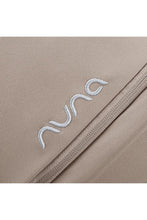 
                        
                          Load image into Gallery viewer, Nuna infant car seat pipa next in colour chateau Close-up of a  fabric with 'nuna' logo embroidered on it.
                        
                      
